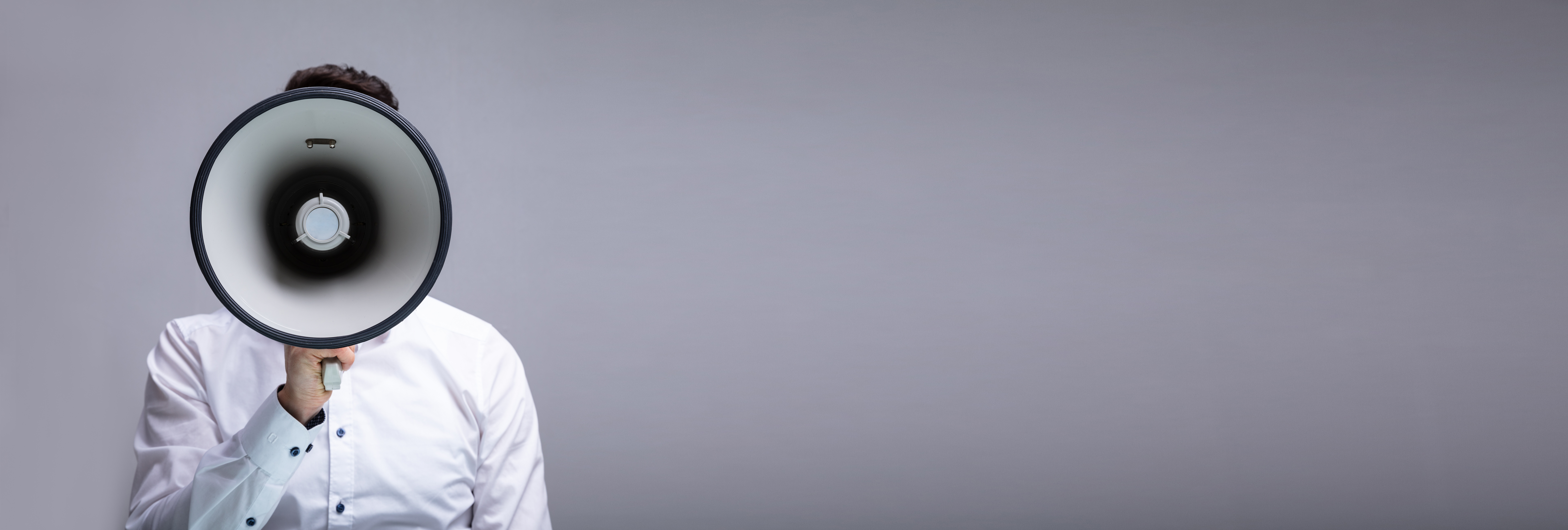 Man Doing Announcement On Megaphone