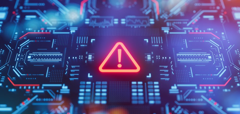 Warning icon on a digital LCD display with reflection.