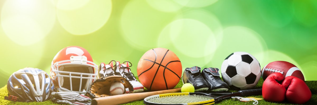 Close-up Of Various Sport Equipments On Pitch