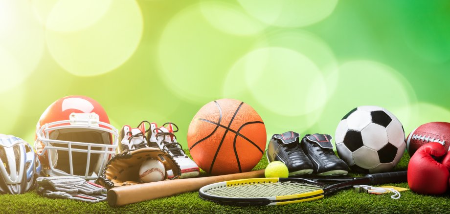 Close-up Of Various Sport Equipments On Pitch