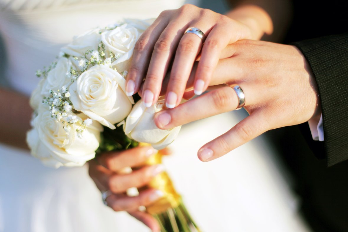 Wedding rings and hands Wedding rings and hands